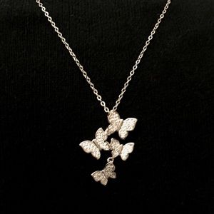 NWOT Silver Butterfly Necklace (Free gift pouch)